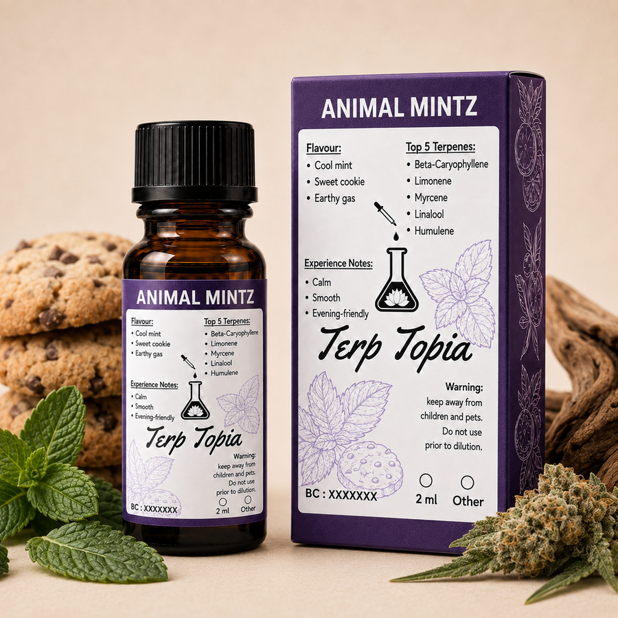A small amber glass bottle and its matching purple box for Animal Mintz Terp Topia, styled on a beige surface with mint leaves and dried cannabis buds in the background.